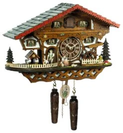 KU4246QMT - Quartz Musical Chalet W/ Man Chasing Boy On Farm